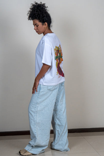 Model wearing DOKAI Oversized T-shirt — Memento Mori wearable art by GEEMEEO